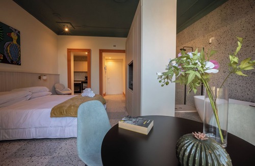 Acireale Bed & Breakfast | Charming elegant room in central Acireale with serene garden view