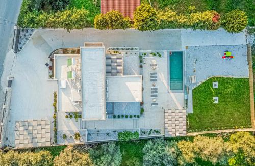 Mourniai Villa | Chris and Stratos villa with private ecologic pool and kid's playground!