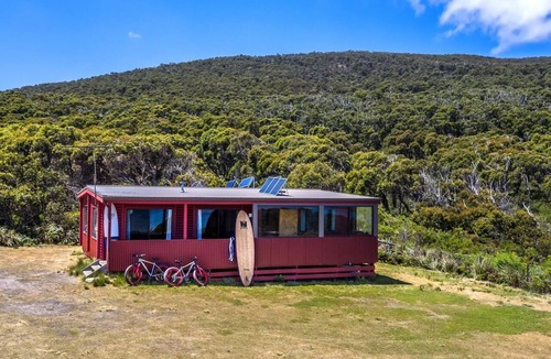 South Bruny Cabin | Cloudy Bay Cabin - Sometimes, the simplest pleasures in life are the best. This sums up Cloudy Bay Cabin; an unpretentious and welcoming little timber cottage surrounded by South Bruny National Park and just metres from the shores of beautiful Cloudy