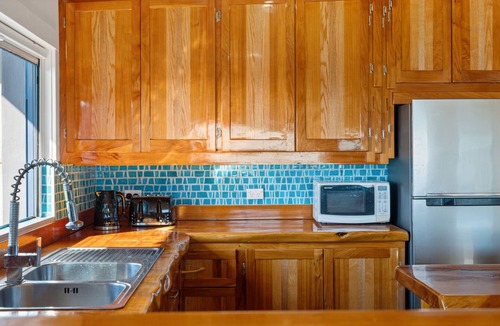 Warea House | Coastal Daze - New Plymouth Holiday Home