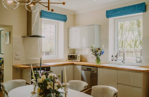 Stranraer Cottage | Coastal Magnificence: Saltwater Chronicles with private sea view deck.