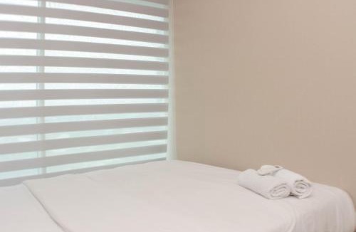 Pekayon Jaya Apartment | Comfort 2BR at Grand Kamala Lagoon Apartment By Travelio