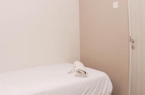 Pekayon Jaya Apartment | Comfort 2BR at Grand Kamala Lagoon Apartment By Travelio