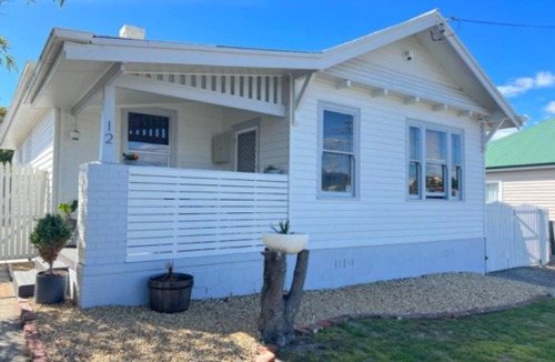 Bellerive Apartment | Comfy home within walking distance to beach, restaurants and Blunderstone area.