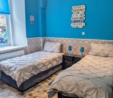 Rothesay House | Commodore Guesthouse, Seaside Holiday Suites