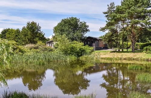 Kirkcudbright Ski Chalet | Country and modern cladded lodge with sea views.