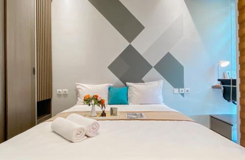 Cikarang Apartment | Cozy Living Studio Vasanta Innopark Apartment By Travelio
