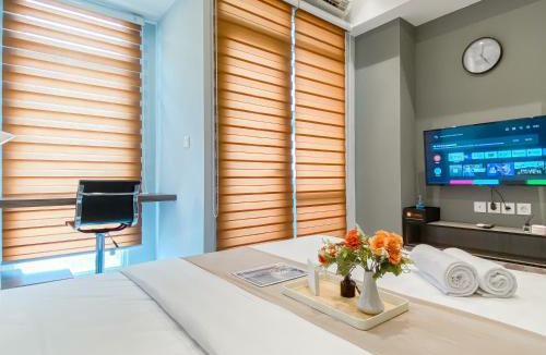 Cikarang Apartment | Cozy Living Studio Vasanta Innopark Apartment By Travelio