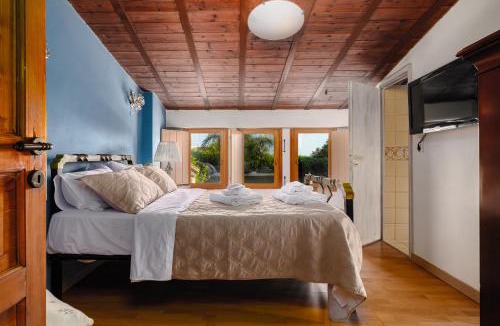 Kalyvia Thorikou Villa | Divine Stone House