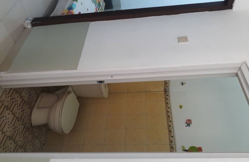 Ngaglik House | Drono Guest House terletak di sisi sawah dengan suasana yang tenang