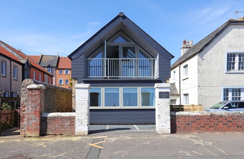 Dunbar Villa | Experience modern coastal living at its finest in this unique one-bedroom property. Sleeps 2.