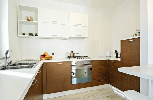 Marchesana Apartment | Flat with barbecue, terrace and pool