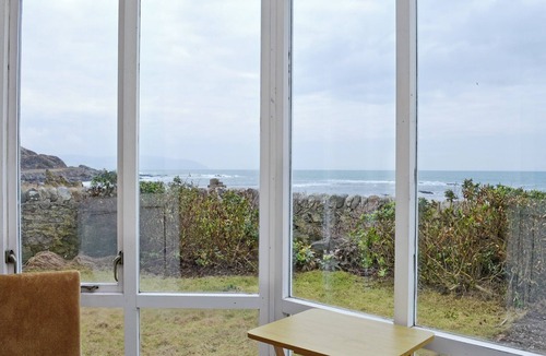 Bellochantuy Cottage | A detached cottage with views across to Gigha and the Paps of Jura.