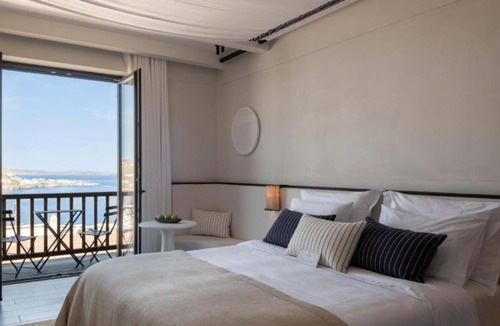 Drafaki Hotel | Gorgeous Private Terrace Suite with Breathtaking Mykonos Windmill Views