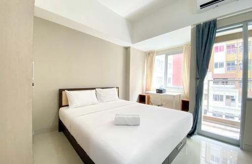 Duren Sawit Apartment | Great Choice Studio Apartment Gateway Park LRT City Jatibening By Travelio