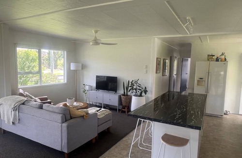 Tolaga Bay House | Great river views from this cute modernised and homely cottage!