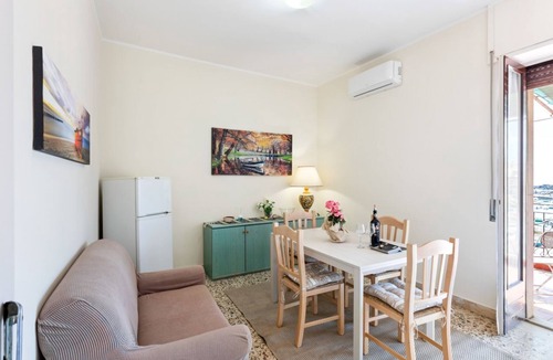 Aci Trezza Apartment | GuestHost - This comfortable 80sqm apartment can accommodate up to 3 people (distributed over 2 levels with internal stairs) located on the first floor, without a lift, of a characteristic building overlooking the Cyclops Riviera and Lachea Island. In 5