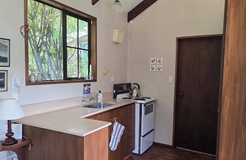 Akaroa House | Harbour-view haven - with a large garden.