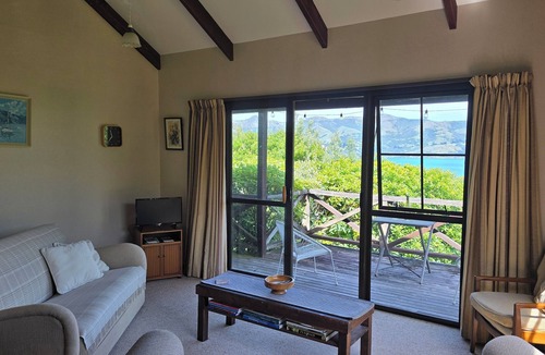 Akaroa House | Harbour-view haven - with a large garden.