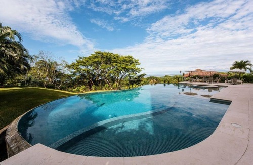 Tarcoles Condo | Hilltop condo with beautiful ocean view!