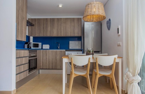 Son Carrio Apartment | Holiday Apartment "Menorca Blue" with Shared Pool, Private Terrace & A/C