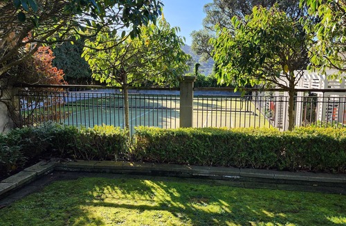 Karori House | Home with Hot Tub, Heated Pool & Tennis Court