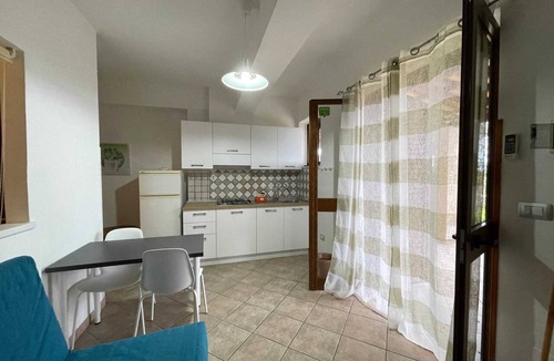 Parghelia Apartment | Homerez - Bright House in Vibo Valentia, Shared Pool