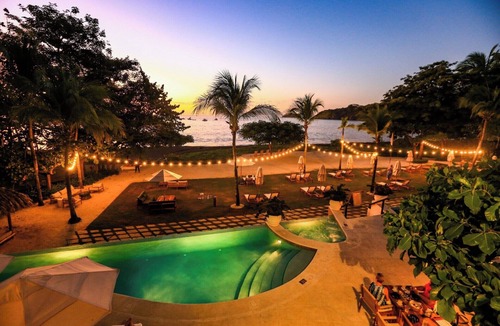 Coco Condo | Impressively designed and decorated 3rd-floor space overlooking pool in Coco