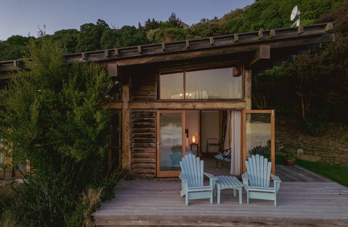 Cape Saunders Resort | Kahu Studio Wake up with a stunning view from the Papanui Inlet