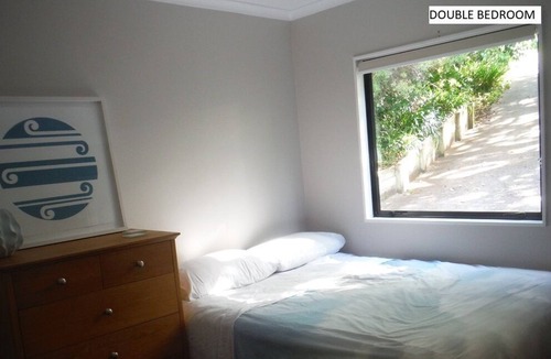 Raglan House | Leafy & private Raglan hideaway
