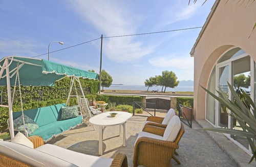 Puerto de Pollensa Ski Chalet | Llenaire - Xata, seafront house with private pool in Puerto de Pollença