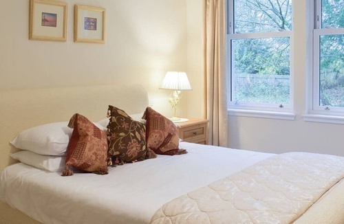Carberry Cabin | Luxury lodge, set in 40 acres of beautiful private gardens at Carberry Tower Estate.