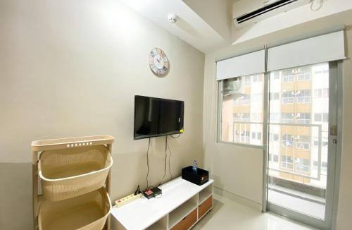Duren Sawit Apartment | Minimalist Studio Room Gateway Park LRT City Jatibening Apartment By Travelio
