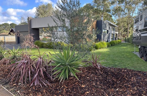 Seven Mile Beach House | Modern Family House in Seaside Village - Close to Airport, Beach and Golf Course