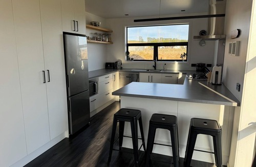 Fairlie House | New house with stunning mountain views and outdoor bath