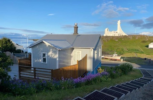 Stykkisholmur Villa | Oceanfront holiday home with outdoor hot tub.