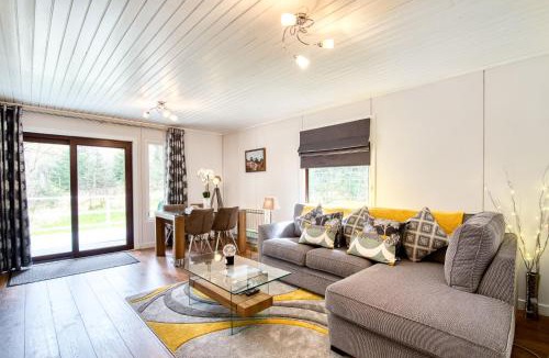 Crianlarich Ski Chalet | Otter with mountain view and enclosed decking