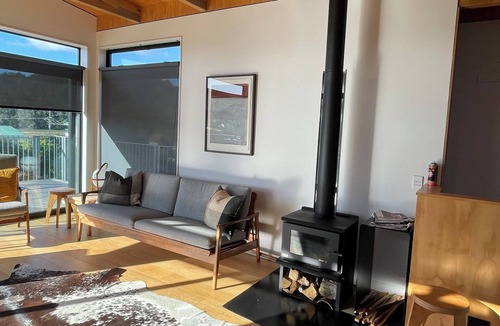 Matapouri House | Peaceful 4-Bedroom Beach House across road from estuary & fantastic beach views