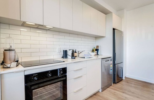 Penrose Apartment | Penrose 2BR Gem with Parking and Air-con