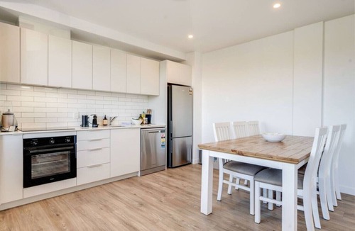 Penrose Apartment | Penrose 2BR Gem with Parking and Air-con