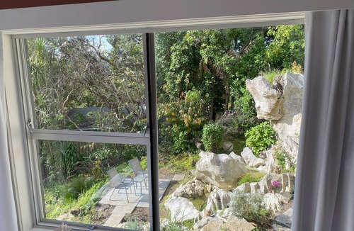 Woodhill Apartment | Private studio with your own waterfall garden and 5 minute walk to Hospital