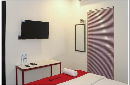 Palangkaraya Hotel | RedDoorz @ Paus Raya