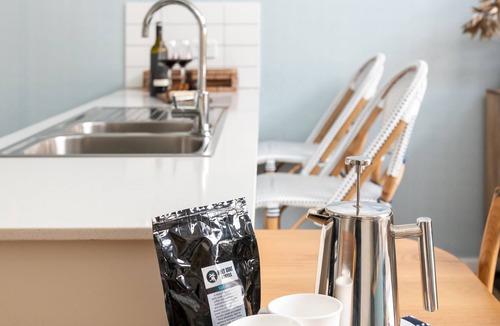 Port Macquarie Villa | Refresh@Shellys. Boardwalk stroll down to beach from modern coastal villa.