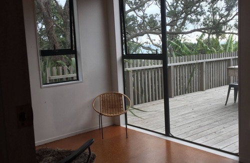 Muriwai House | Relax in our Muriwai Sanctuary amongst the trees.