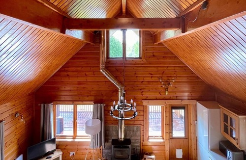 Aberchirder Cabin | Riverside Lodge—3-Bed Retreat in AberdeenshirenCozy, scenic, and peaceful.