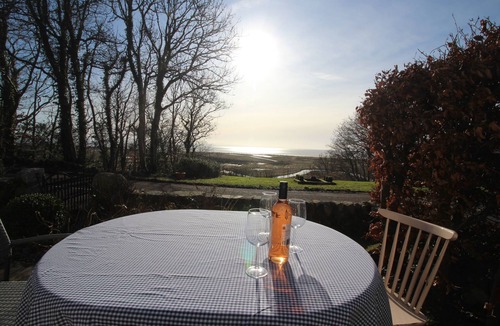 Sandyhills House | Rustic cottage with sea views