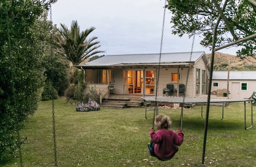 Kairakau House | Slow & Relaxing Days at the cutest old school bach- family & pet-friendly