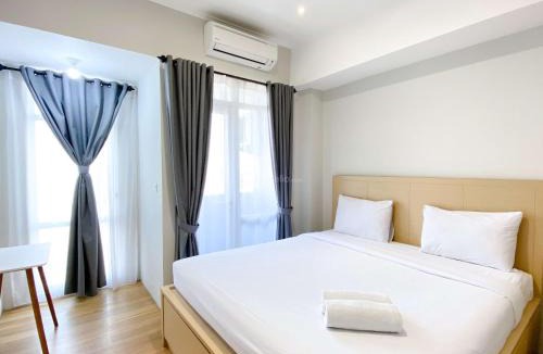 Cikarang Apartment | Spacious and Combined 1BR Vasanta Innopark Apartment By Travelio