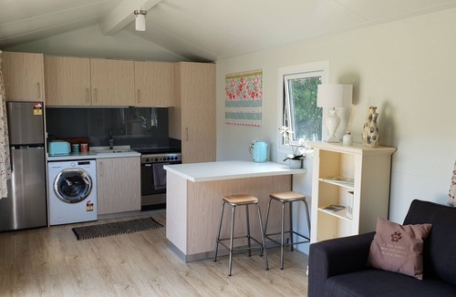Shakespeare Bay Cottage | Stunning location garden setting, farmstead cottage!