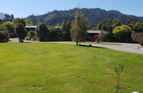 Shakespeare Bay Cottage | Stunning location garden setting, farmstead cottage!